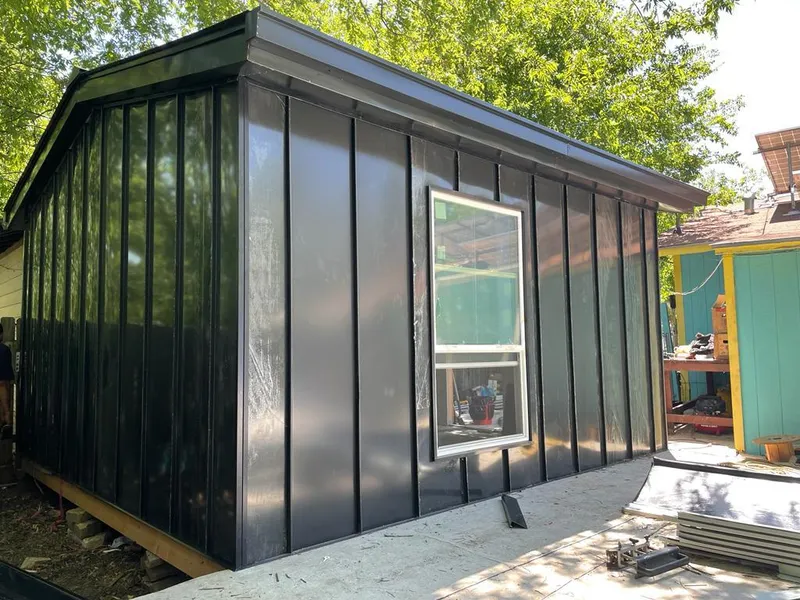 Black standing seam metal wall panels for Roof Inspection in Swannanoa